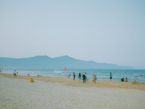 Illustration related to Where do locals eat across the road from My Khe Beach?